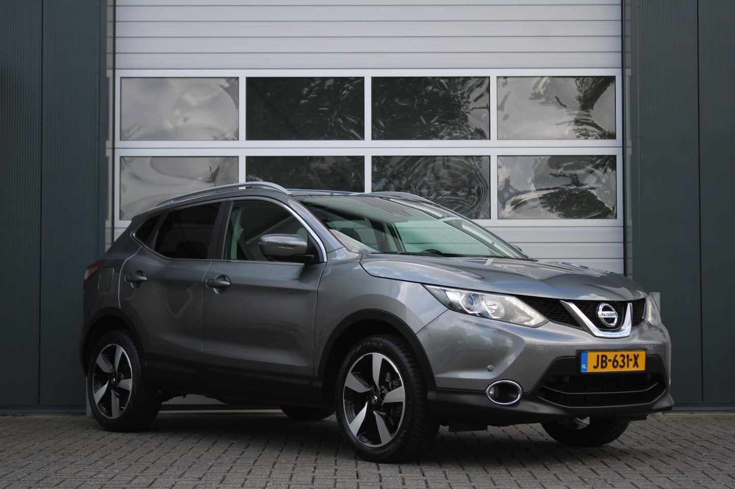 Nissan Qashqai - 1.2 N-Connecta Clima/Cruise/Keyless/360Camera/Navi/Bluetooth/Panodak/RadioCD.AUX.USB/18"LM - AutoWereld.nl