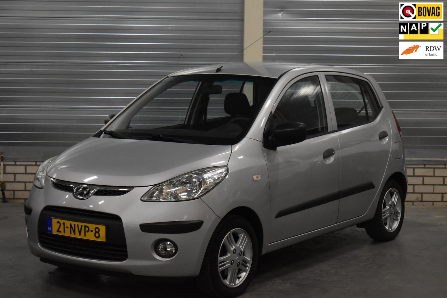 Hyundai i10 - 1.1 Active Orange Babies + Airco - AutoWereld.nl