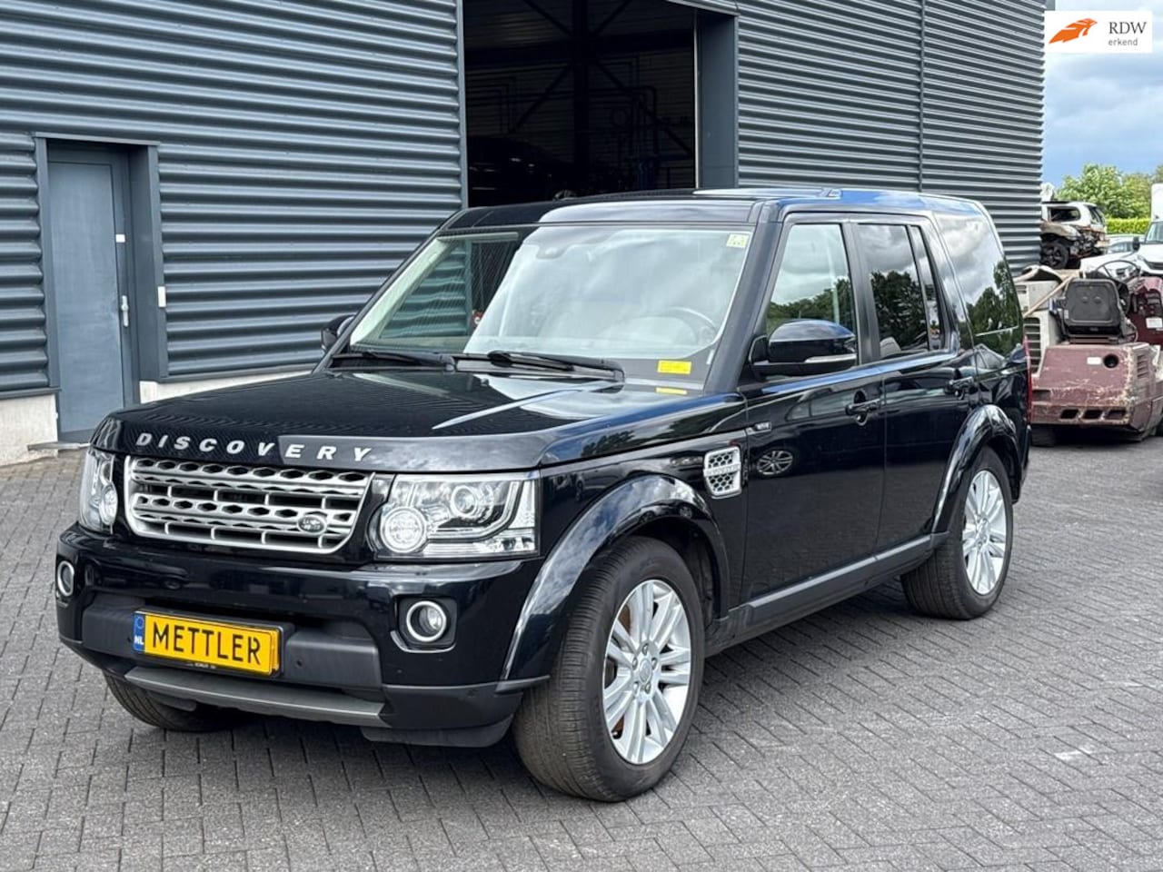 Land Rover Discovery - 3.0 SDV6 XXV Special Edition 3.0 SDV6 XXV Special Edition, 7 PERS, MOTOR SCHADE - AutoWereld.nl