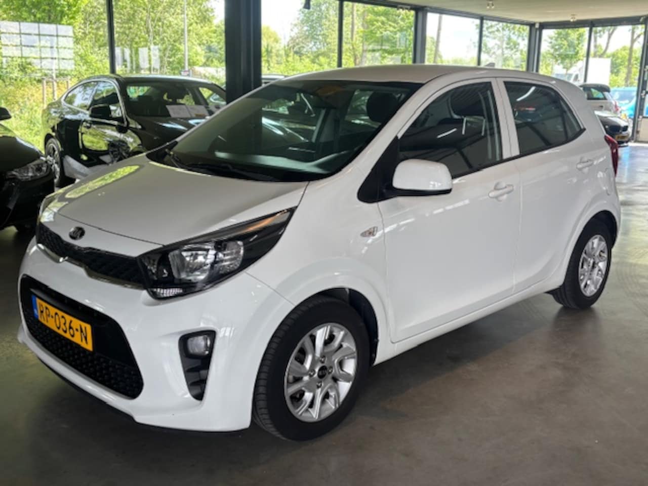 Kia Picanto - 1.0 CVVT 66 PK 5D EconomyPlusLine Navigator - AutoWereld.nl