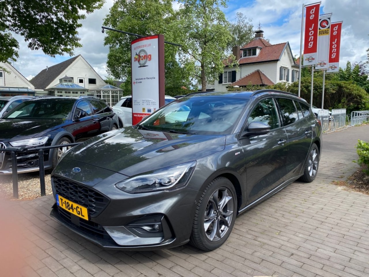 Ford Focus - 1.5 ECOBL. TIT. XBNS AUTOMAAT / ECC / NAVI / TREKHAAK - AutoWereld.nl