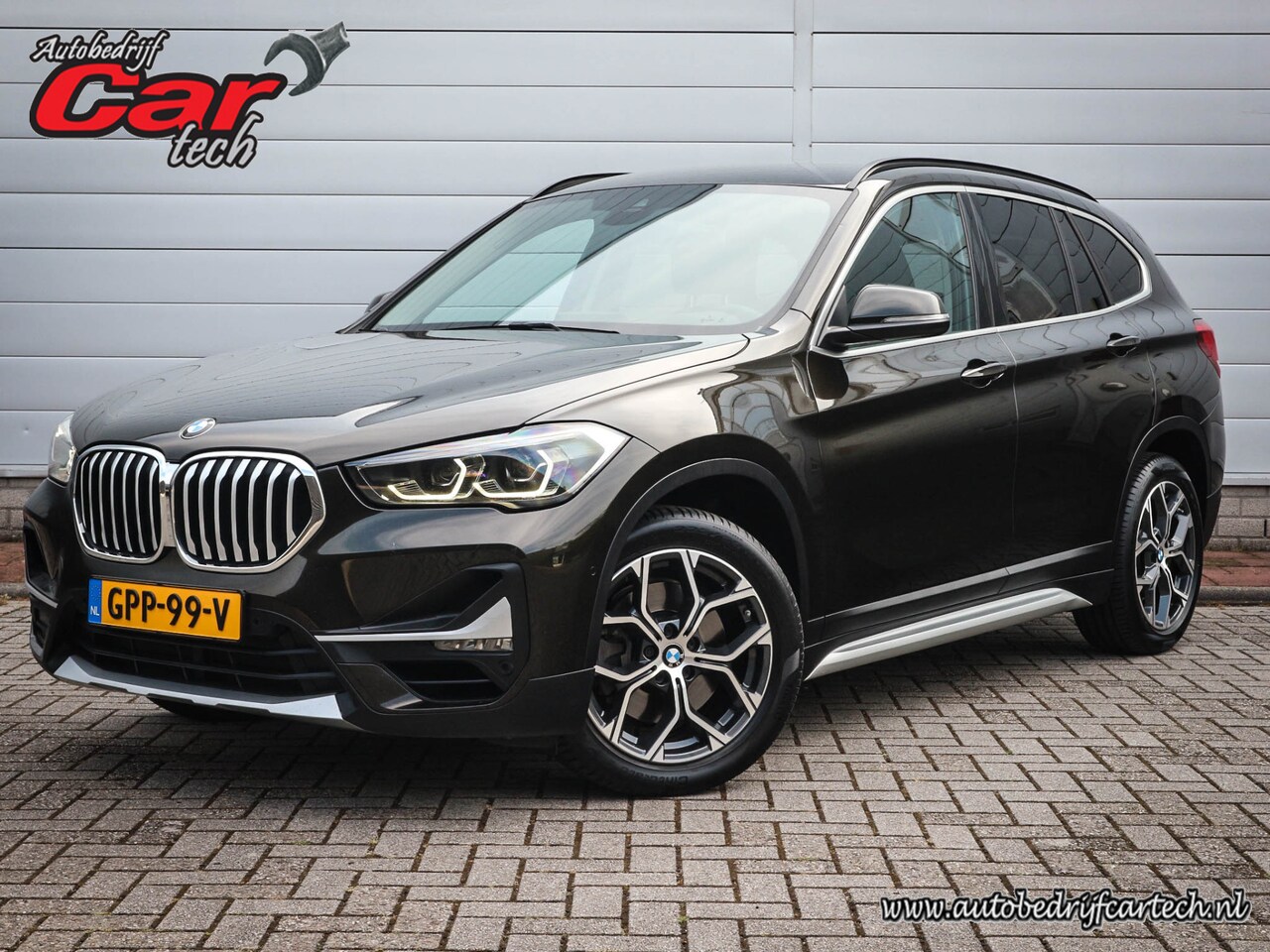 BMW X1 - sDrive20i High Executive | Clima | Cruise | Navi | Pdc | Led | Stoelverwarming | 18 Inch | - AutoWereld.nl