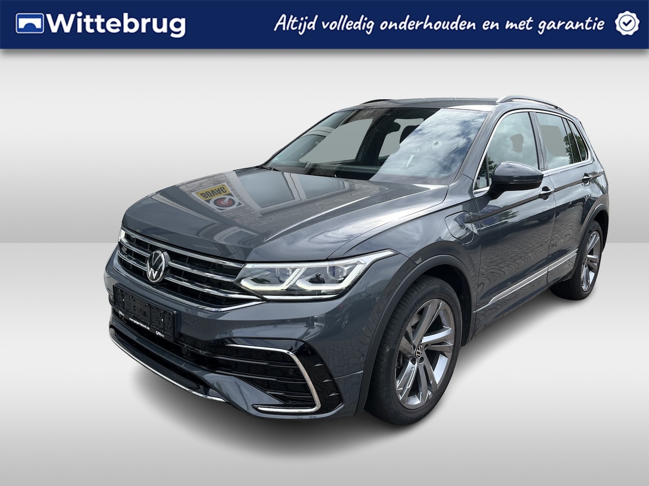 Volkswagen Tiguan - 1.4 TSI eHybrid R-Line / AUTOMAAT/ 2X R-LINE/ 245 PK / ELEKTR. TREKHAAK/ 19" LMV/ HEAD-UP - AutoWereld.nl