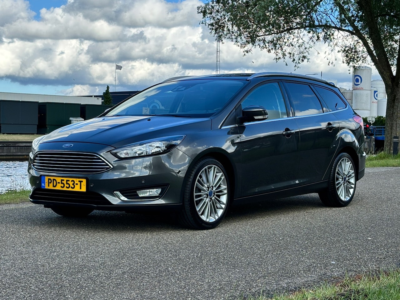 Ford Focus Wagon - 1.5 TDCI Titanium | Navi | Clima | Stuurverw. - AutoWereld.nl
