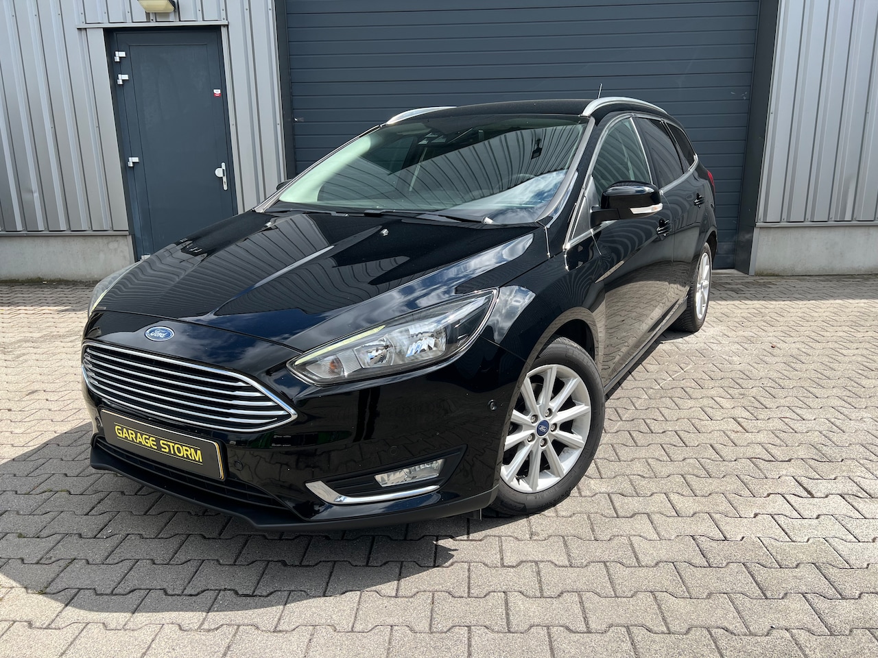 Ford Focus Wagon - 1.0 Titanium Nieuwe motor: 9.000 km gereden - AutoWereld.nl