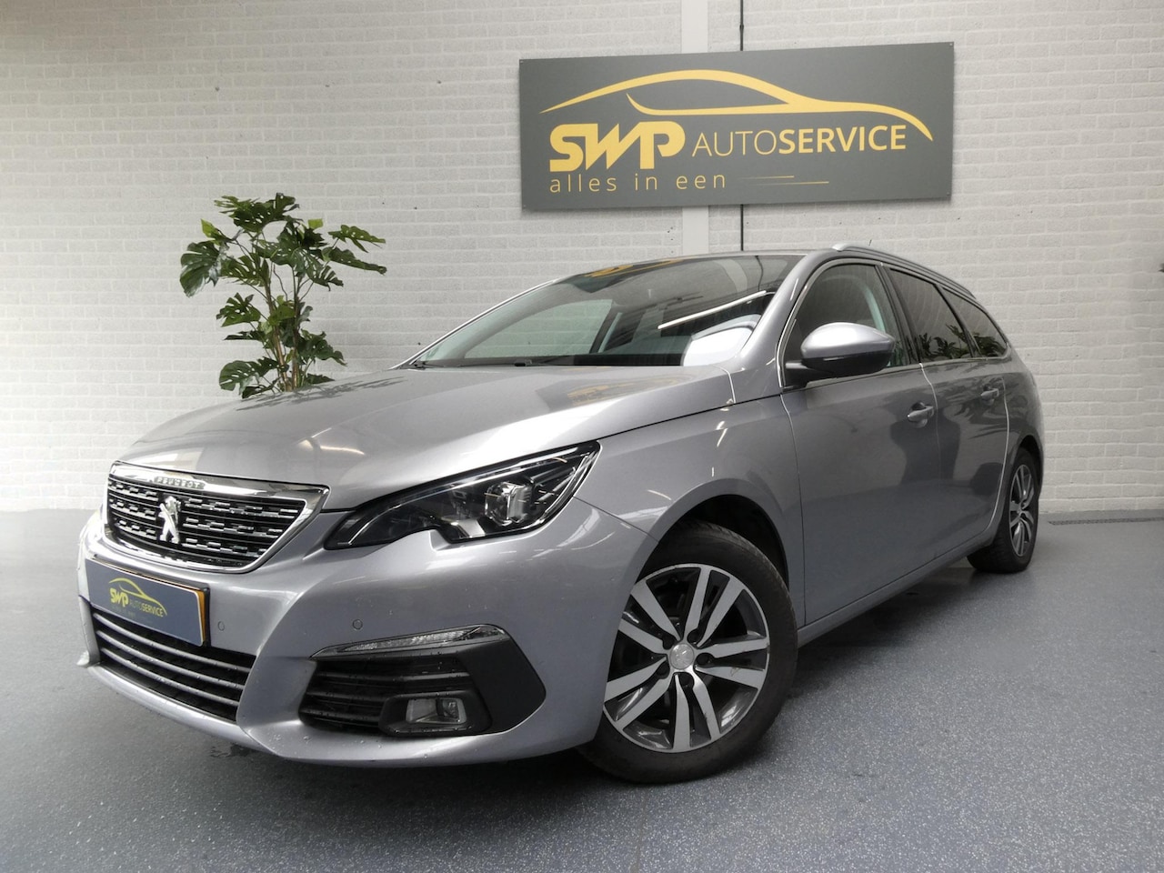 Peugeot 308 SW - 1.2 PureTech Allure | Navi | Cam - AutoWereld.nl