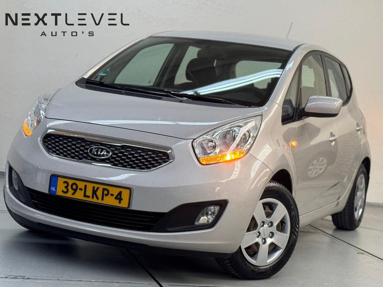 Kia Venga - 1.4 CVVT X-tra LAGE KM STAND Airco Cruise Trekhaak - AutoWereld.nl