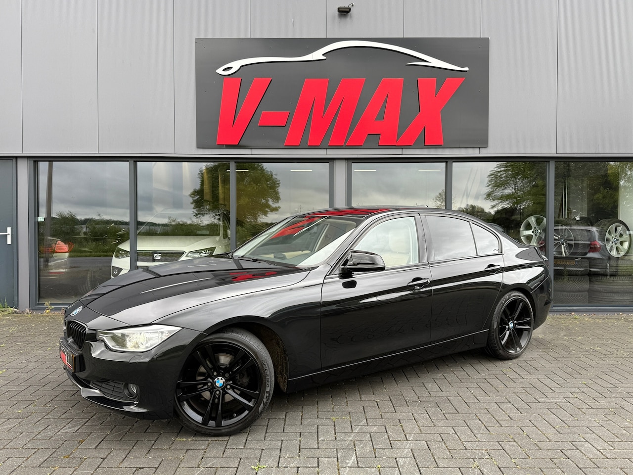 BMW 3-serie - 320i Upgrade Edition Origineel NL Xenon Navi Leder Cruise - AutoWereld.nl