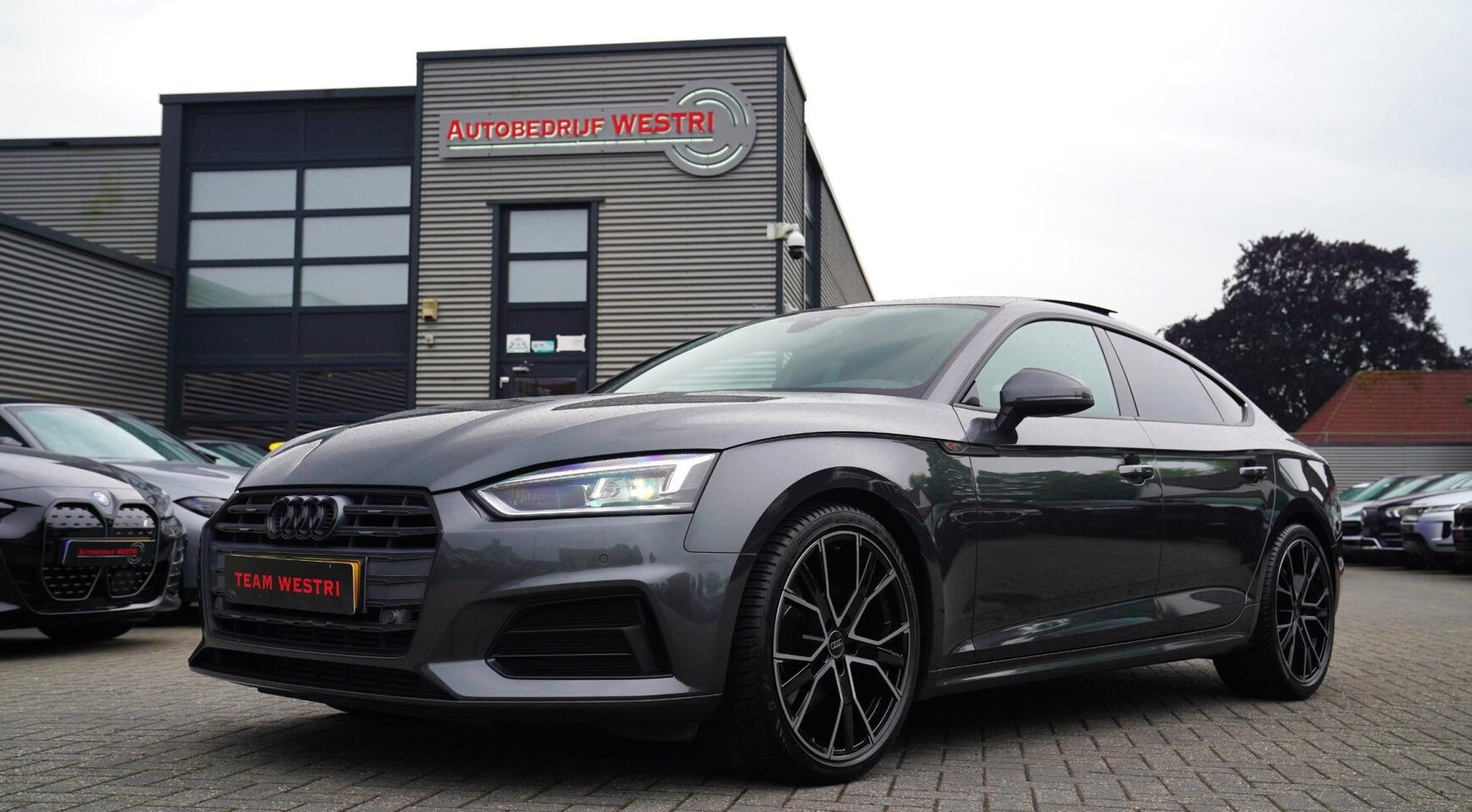 Audi A5 Sportback - 40 TFSI Design Pro Line Plus | Stuurwiel verwarming | Glazen elektrische pano | Achteruitr - AutoWereld.nl