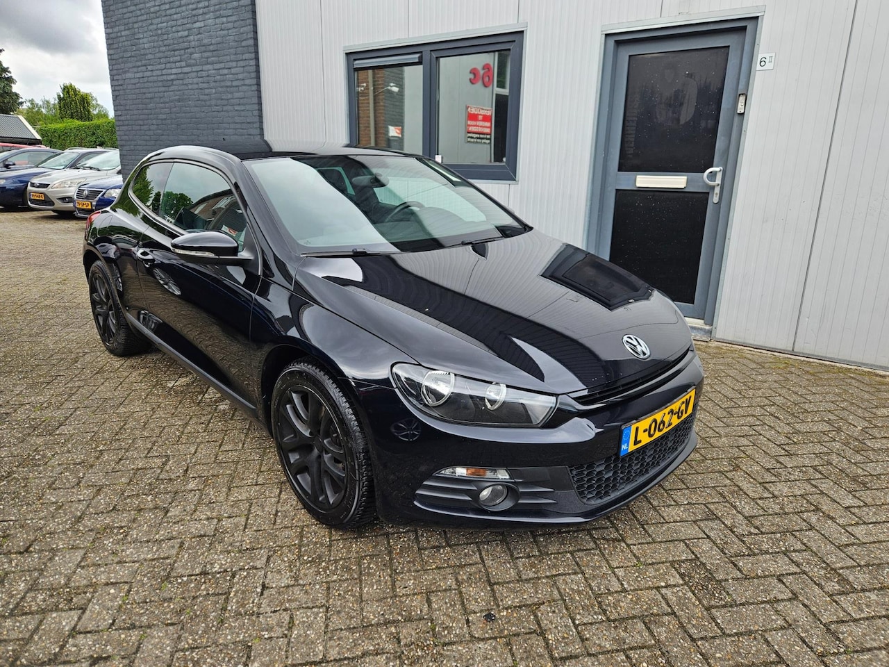 Volkswagen Scirocco - 1.4 TSI AUTOMAAT CLIMA/CRUISE/NAVI - AutoWereld.nl