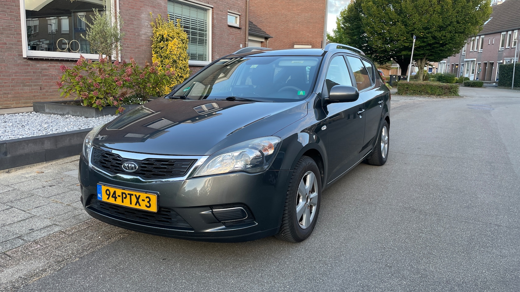 Kia Cee'd Sporty Wagon - 1.4 CVVT X-tra - AutoWereld.nl