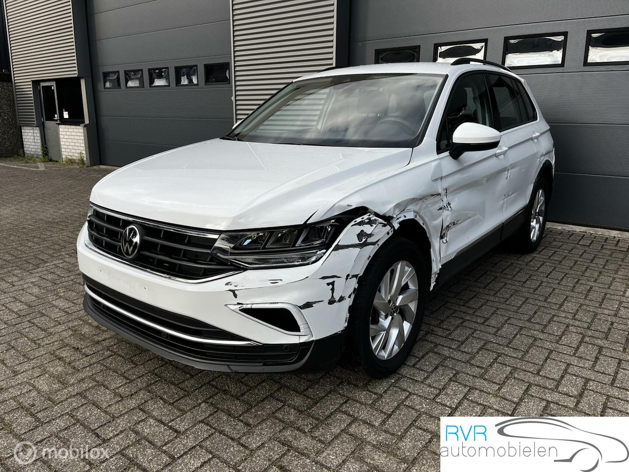 Volkswagen Tiguan - 2.0 TSI 4Motion NAVI / CRUISE / CAMERA - AutoWereld.nl