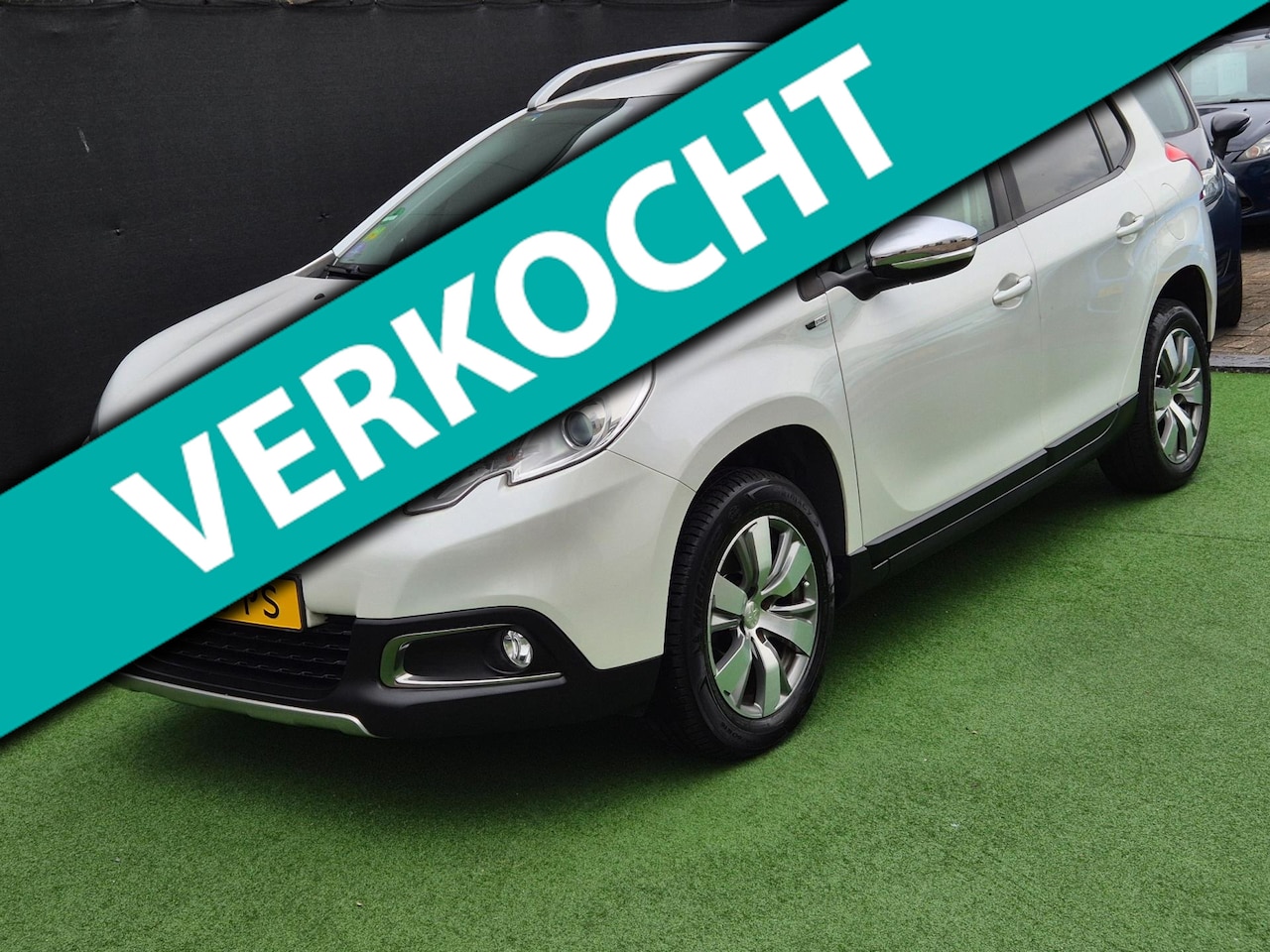 Peugeot 2008 - 1.2 Style PARELMOER NAVI! - AutoWereld.nl
