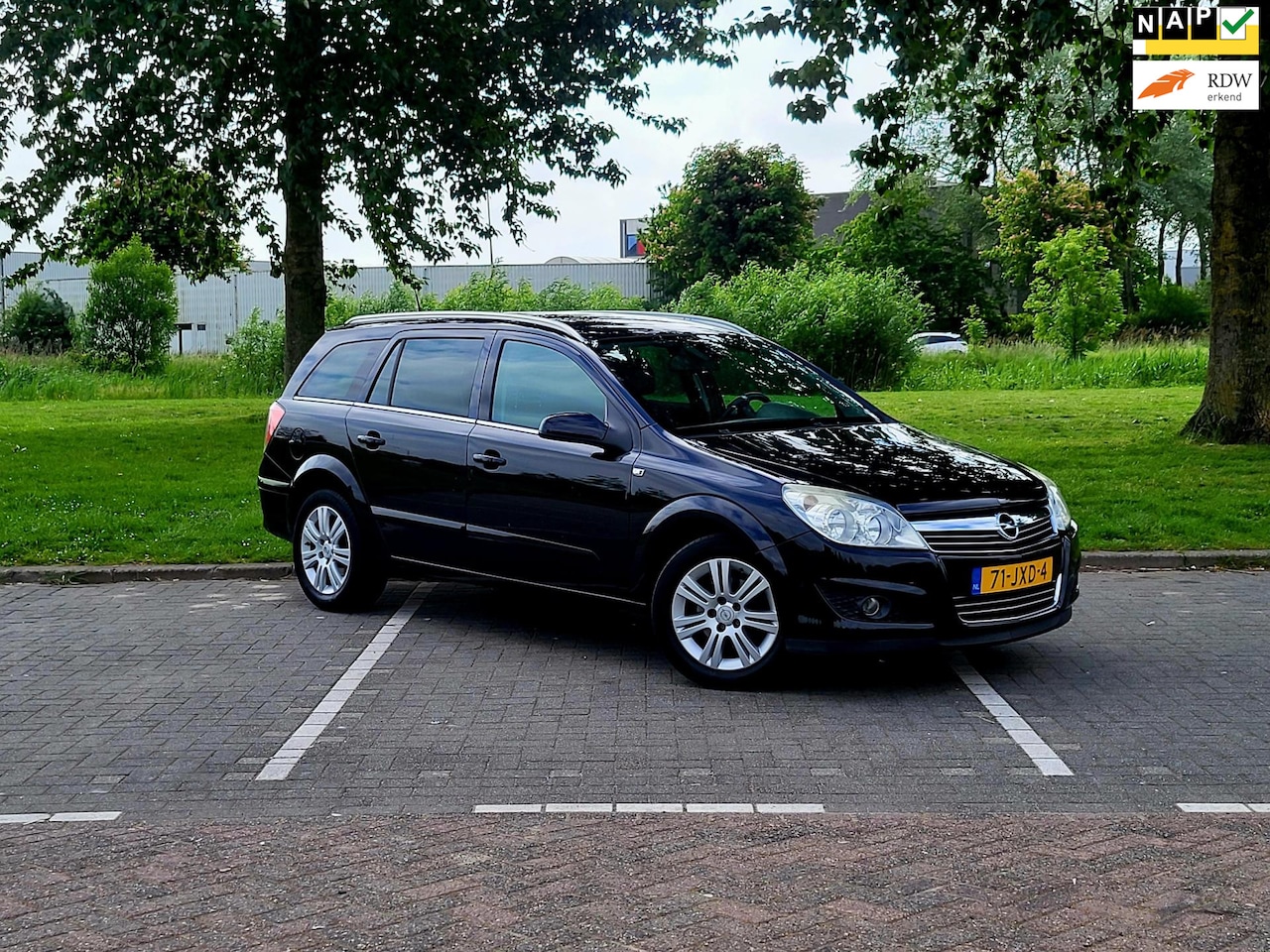 Opel Astra Wagon - 1.6 Cosmo / Airco / Nap / Pdc / Trekhaak / Leer / Navi / Cruise control - AutoWereld.nl