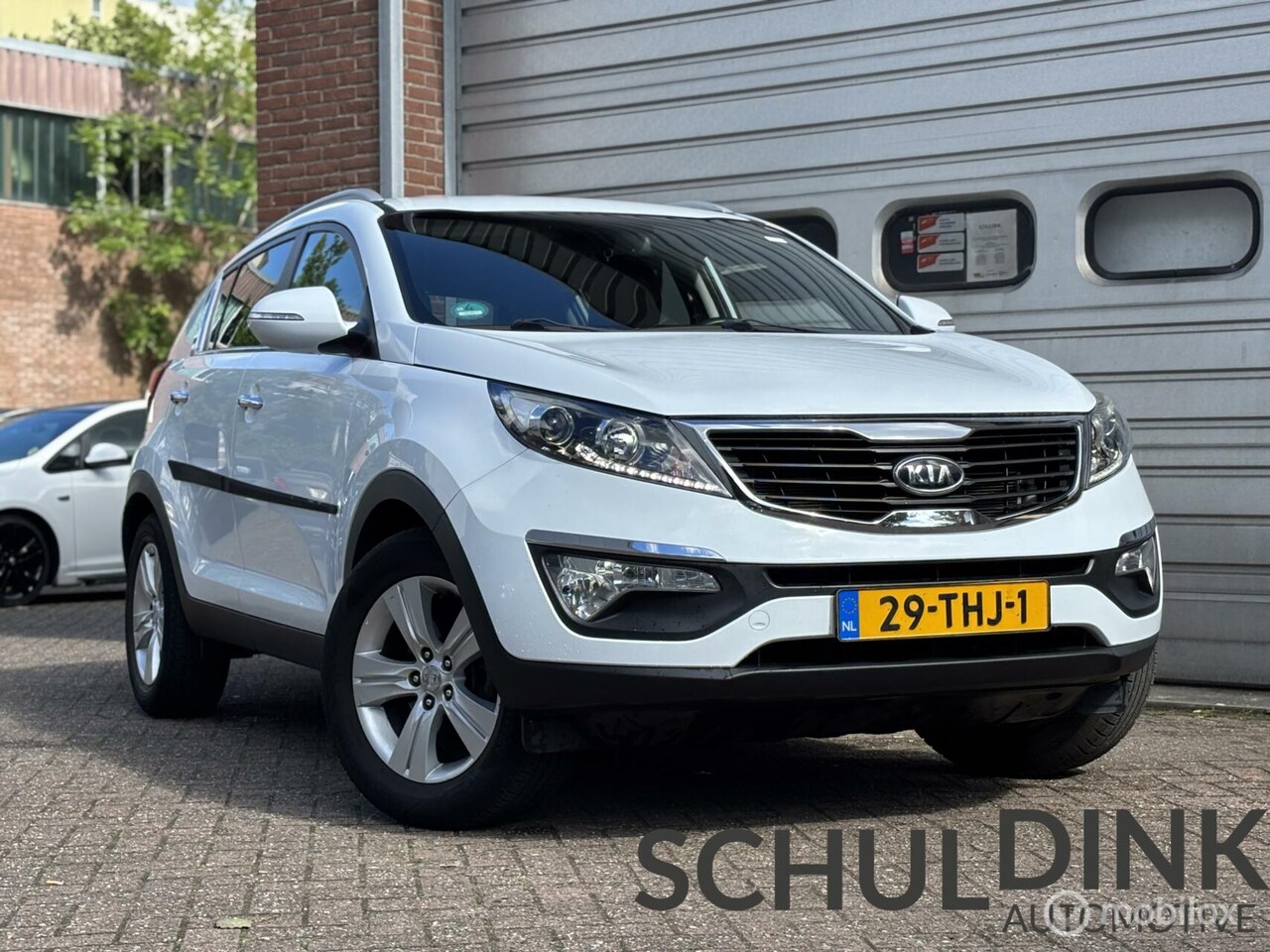 Kia Sportage - 1.6 GDI ISG X-ecutive Plus Pack TREKHAAK|CRUISE CONRTOLR - AutoWereld.nl