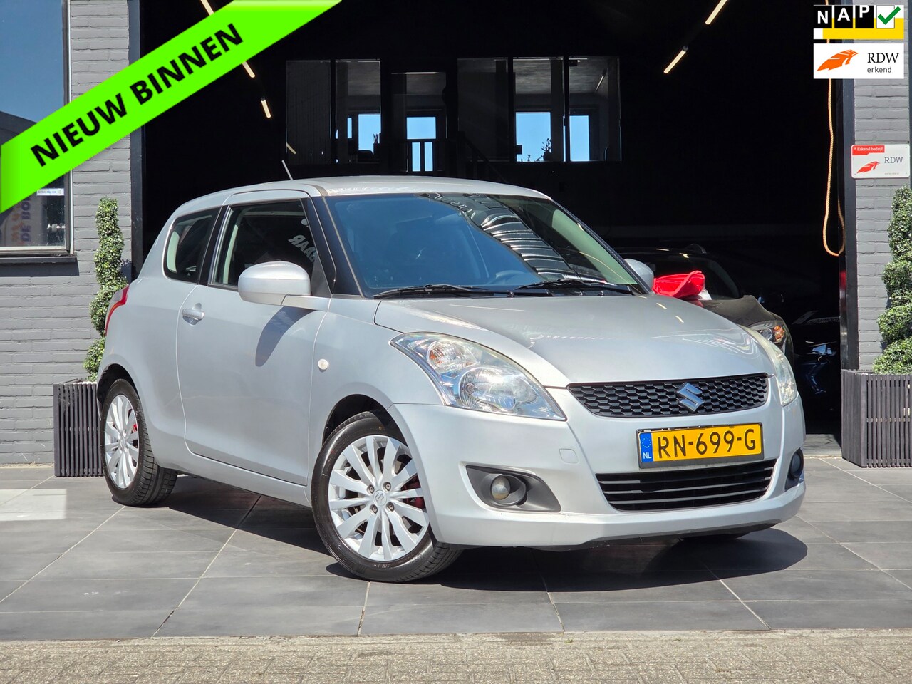 Suzuki Swift - 1.2 Exclusive EASSS|AIRCO|APK|STOELVERWARMING - AutoWereld.nl