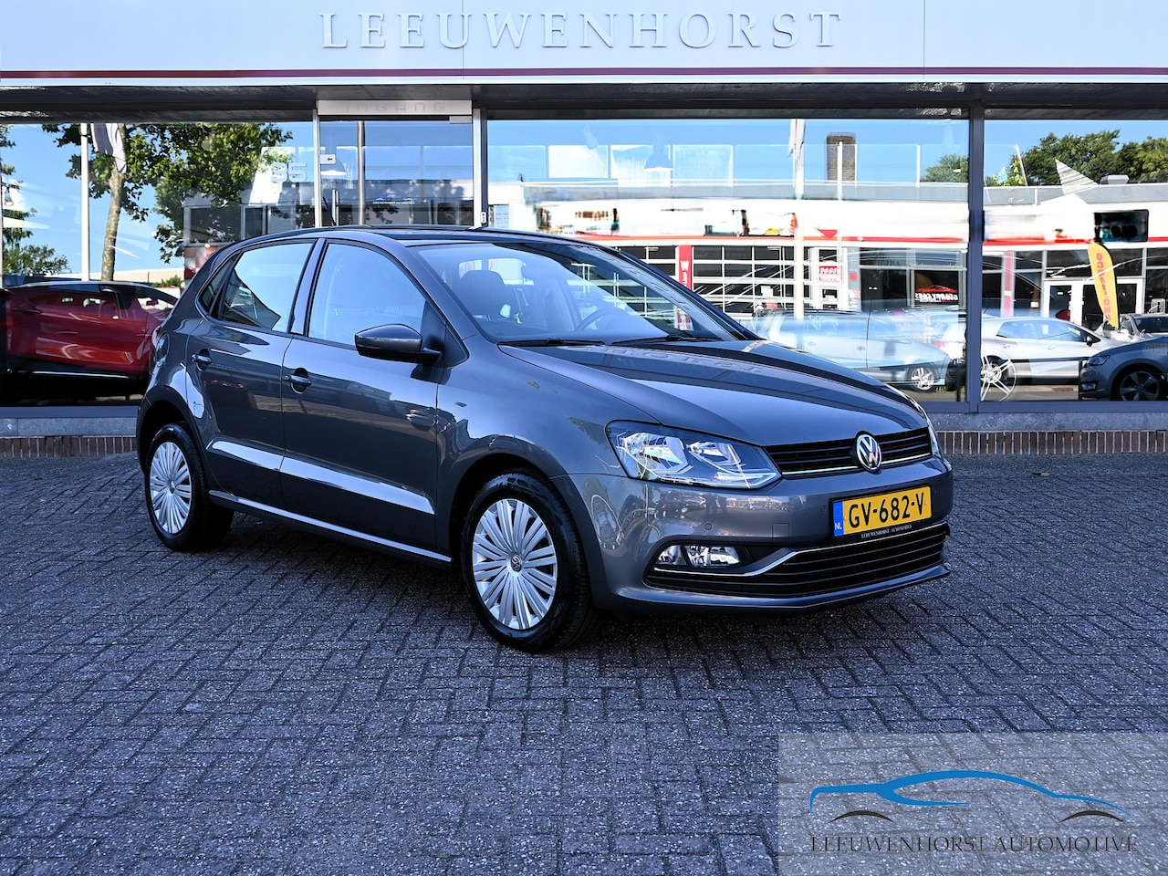 Volkswagen Polo - 1.2 TSI Comf. line, AUTOMAAT, 48.600 km!, clima, cruise, navi, 2 x PDC, NL dealerauto - AutoWereld.nl