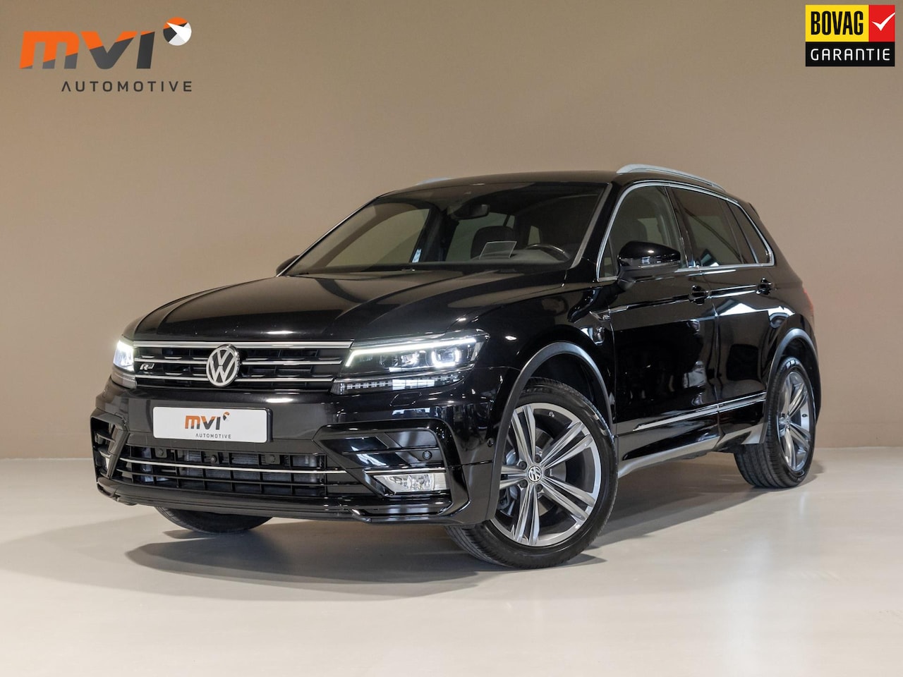 Volkswagen Tiguan - 2.0 TSI 4Motion 2x R-line / 220pk / Leder / Pano / Led / Head-up / Virtual Cockpit / 360 c - AutoWereld.nl