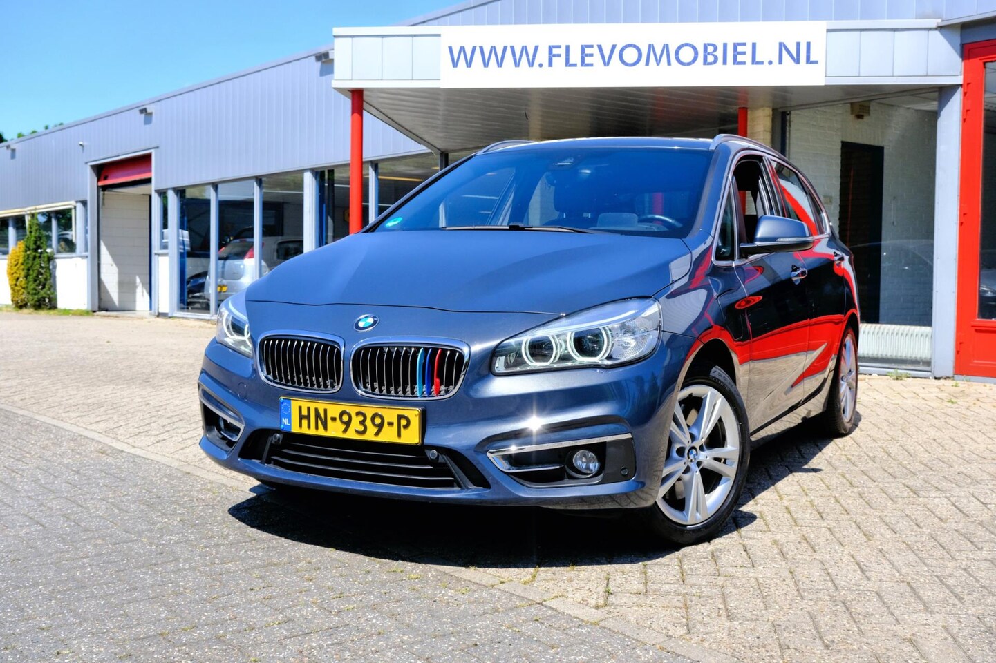 BMW 2-serie Active Tourer - 225xe Centennial High Executive Aut. Pano|Leder|Navi|Cam - AutoWereld.nl
