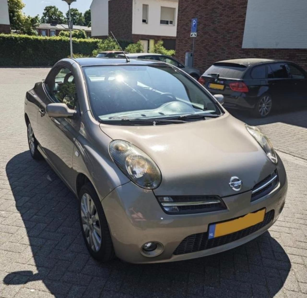 Nissan Micra C+C - 1.6 Tekna Incl. Windvanger - AutoWereld.nl