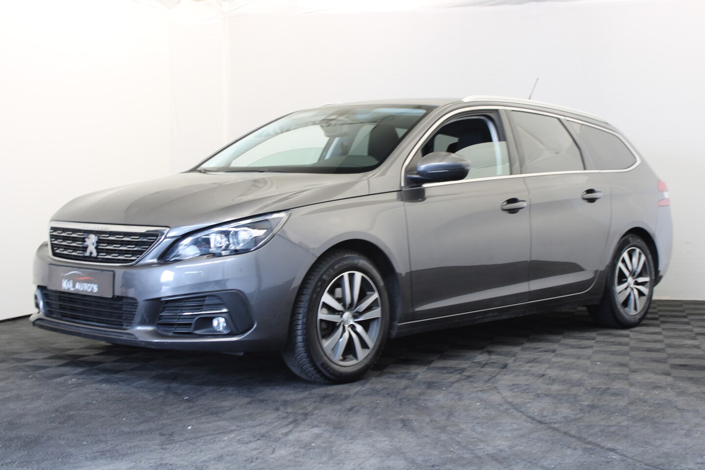 Peugeot 308 SW - 1.2 PureTech Allure *Hemelvaart geopend* - AutoWereld.nl