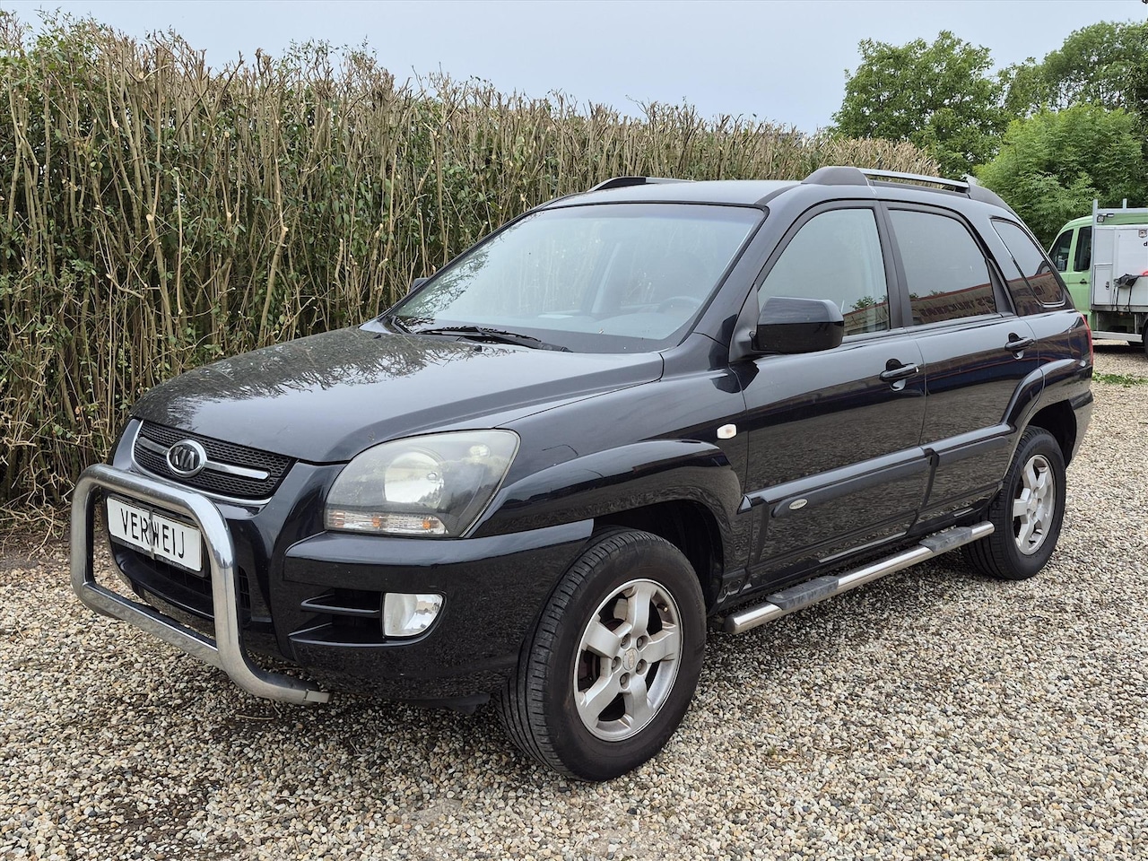 Kia Sportage - 2.0 2WD X-ception | Stoelverwarming | Cruise | Clima | PDC | Leder - AutoWereld.nl