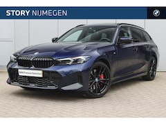 BMW 3-serie Touring - 320e High Executive M Sport Automaat / Panoramadak / Trekhaak / Sportstoelen / Stoelverwar