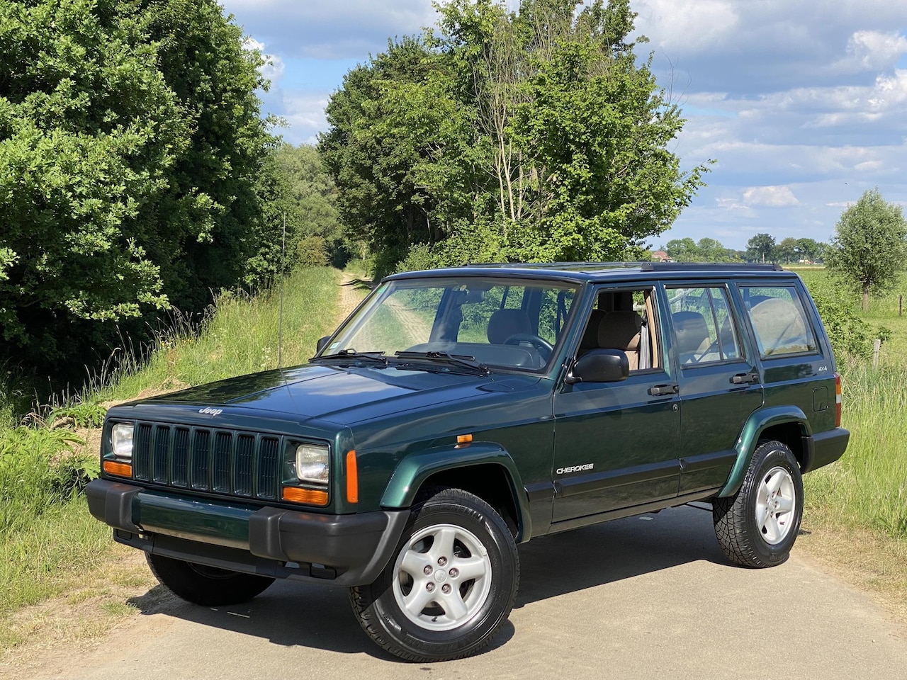 Jeep Cherokee - 2.5i Sport 2.5i Sport - AutoWereld.nl