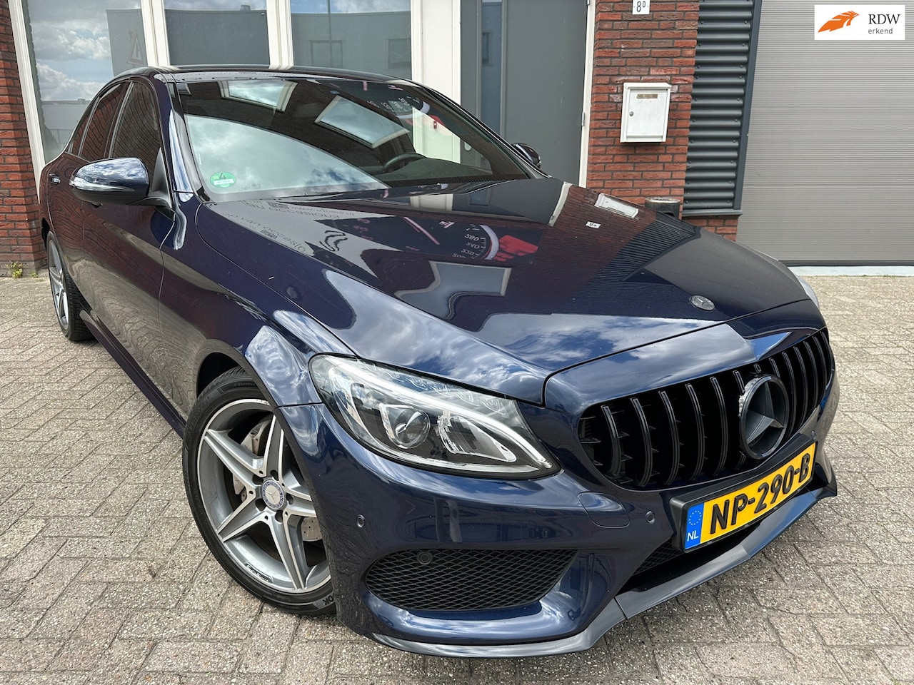 Mercedes-Benz C-klasse - 180 AMG Sport Edition / Navi / Leder / PDC / Cruise - AutoWereld.nl