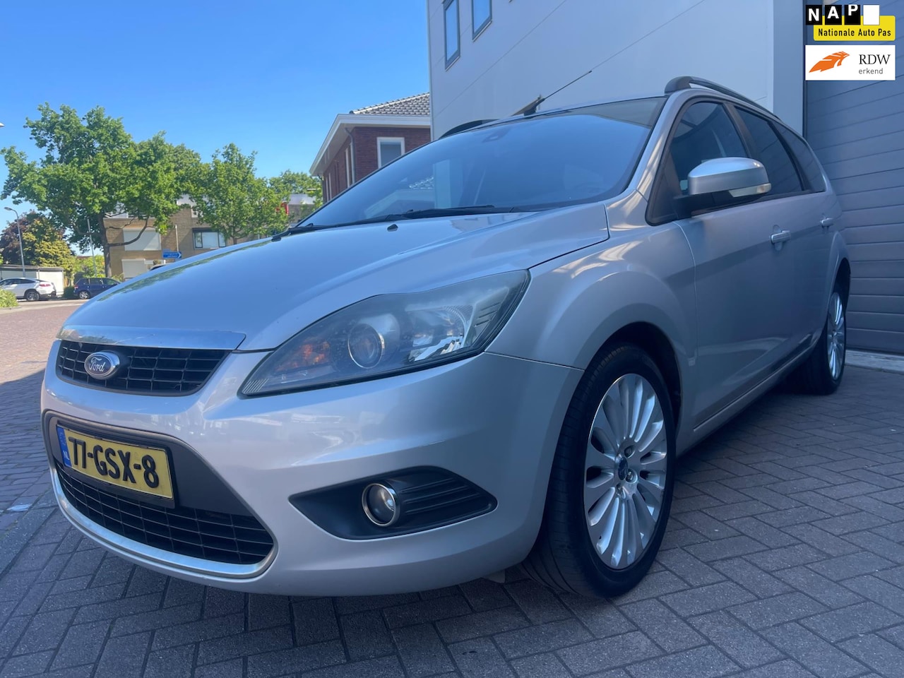Ford Focus Wagon - 1.6 Titanium/Navi/Cruise-c/Climate-c/Leder/PDC/LMV - AutoWereld.nl
