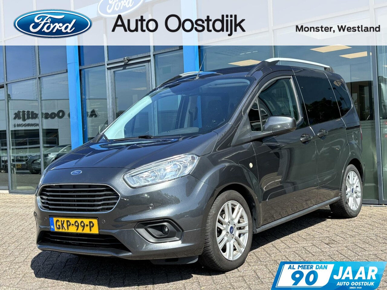 Ford Tourneo Courier - 1.0 Titanium 100PK Cruise Navi Camera Climate Stoelverwarming Verwarmde Voorruit Parkeerse - AutoWereld.nl