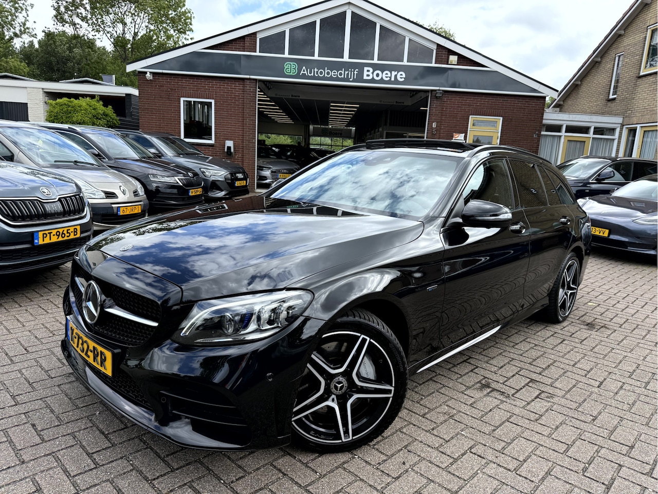 Mercedes-Benz C-klasse Estate - 300 e Business Solution AMG Limited Panoramadak, Camera, Trekhaak - AutoWereld.nl