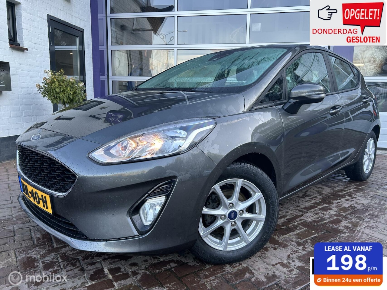 Ford Fiesta - 1.0 * AUTOMAAT * 5 DRS * AIRCO * NAVI * - AutoWereld.nl