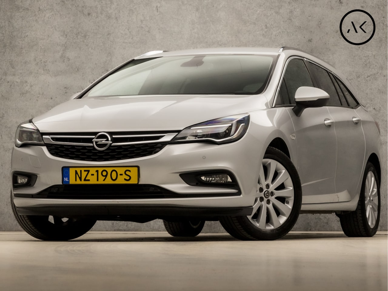 Opel Astra Sports Tourer - 1.0 Sport (APPLE CARPLAY, GROOT NAVI, GETINT GLAS, TREKHAAK, PARKEERSENSOREN, SPORTSTOELEN - AutoWereld.nl