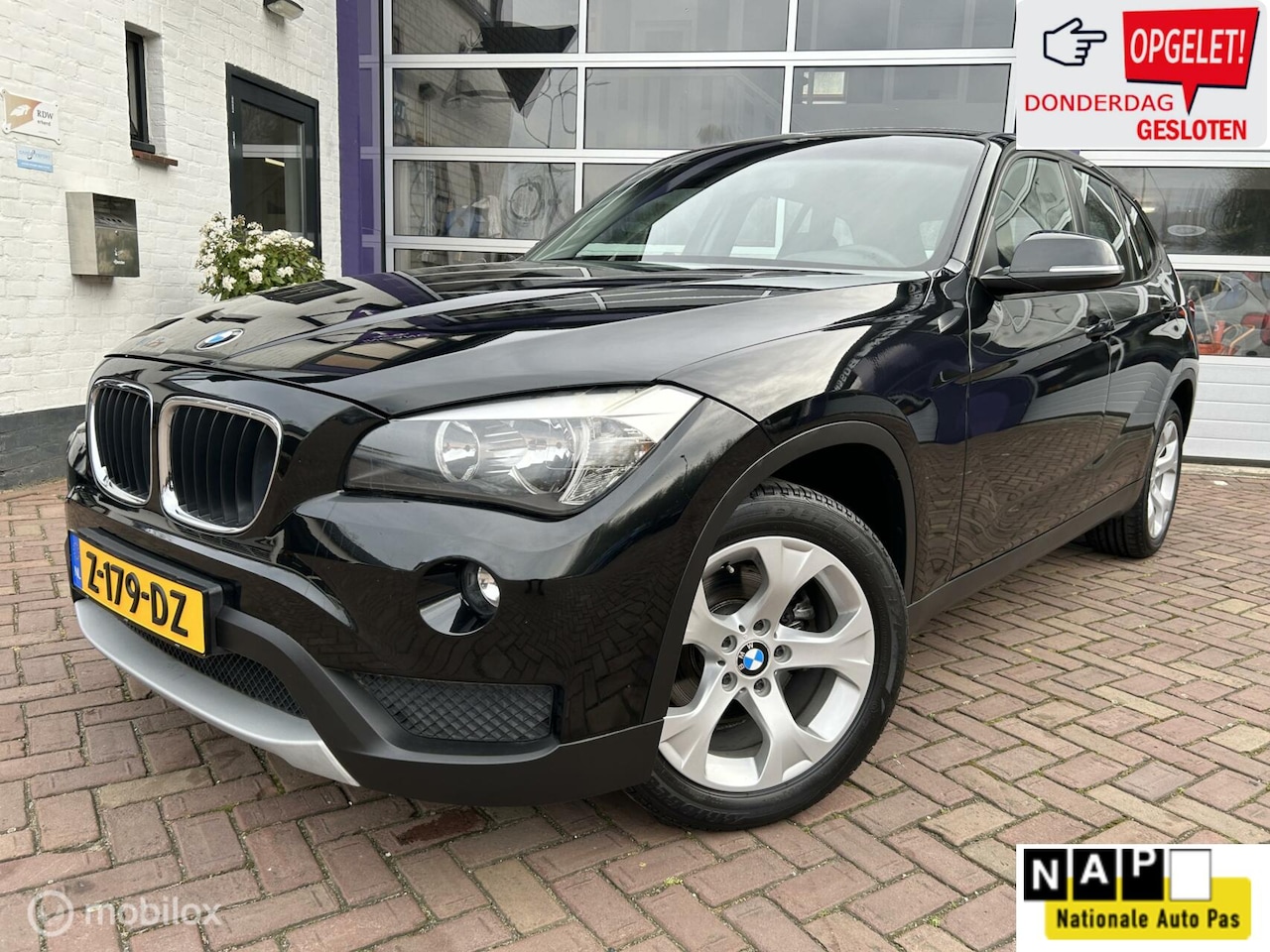 BMW X1 - sDrive18i * AUTOMAAT * NAVIGATIE * AIRCO * - AutoWereld.nl