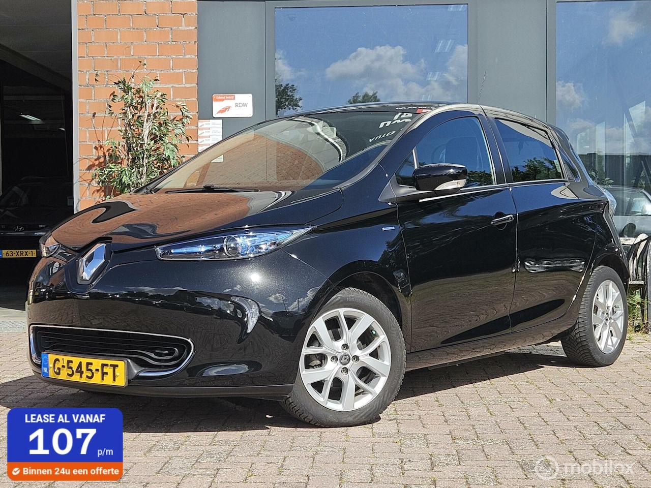 Renault Zoe - R110 Limited 41 kWh Huur Accu Airco Cruise Carplay - AutoWereld.nl