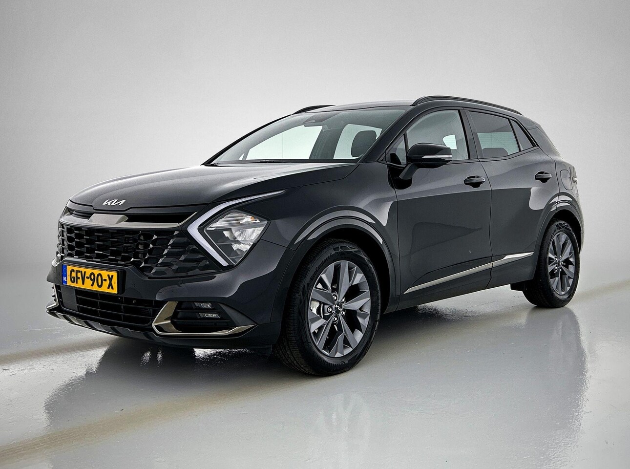 Kia Sportage - 1.6 T-GDi Hybrid Dark Edition 1.6 T-GDi Hybrid Dark Edition - AutoWereld.nl