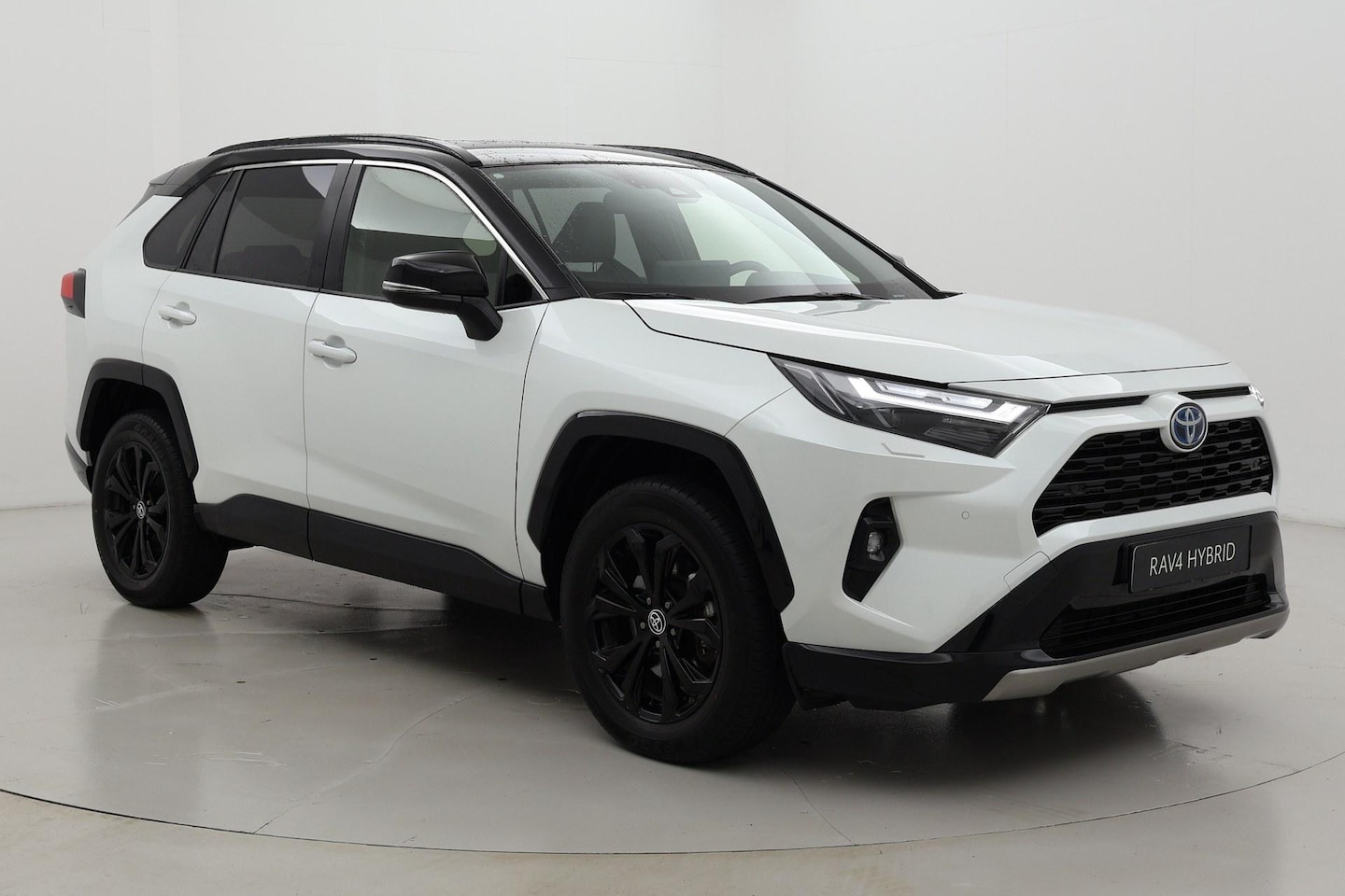 Toyota RAV4 - 2.5 Hybrid AWD Bi-Tone | Navigatie - AutoWereld.nl