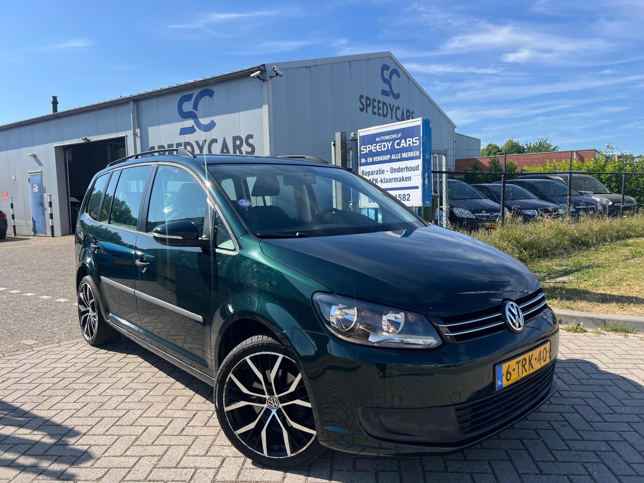 Volkswagen Touran - 1.2 TSI Trendline Bluemotion 7p. 1.2 TSI Trendline Bluemotion 7p 2014 Clima - AutoWereld.nl