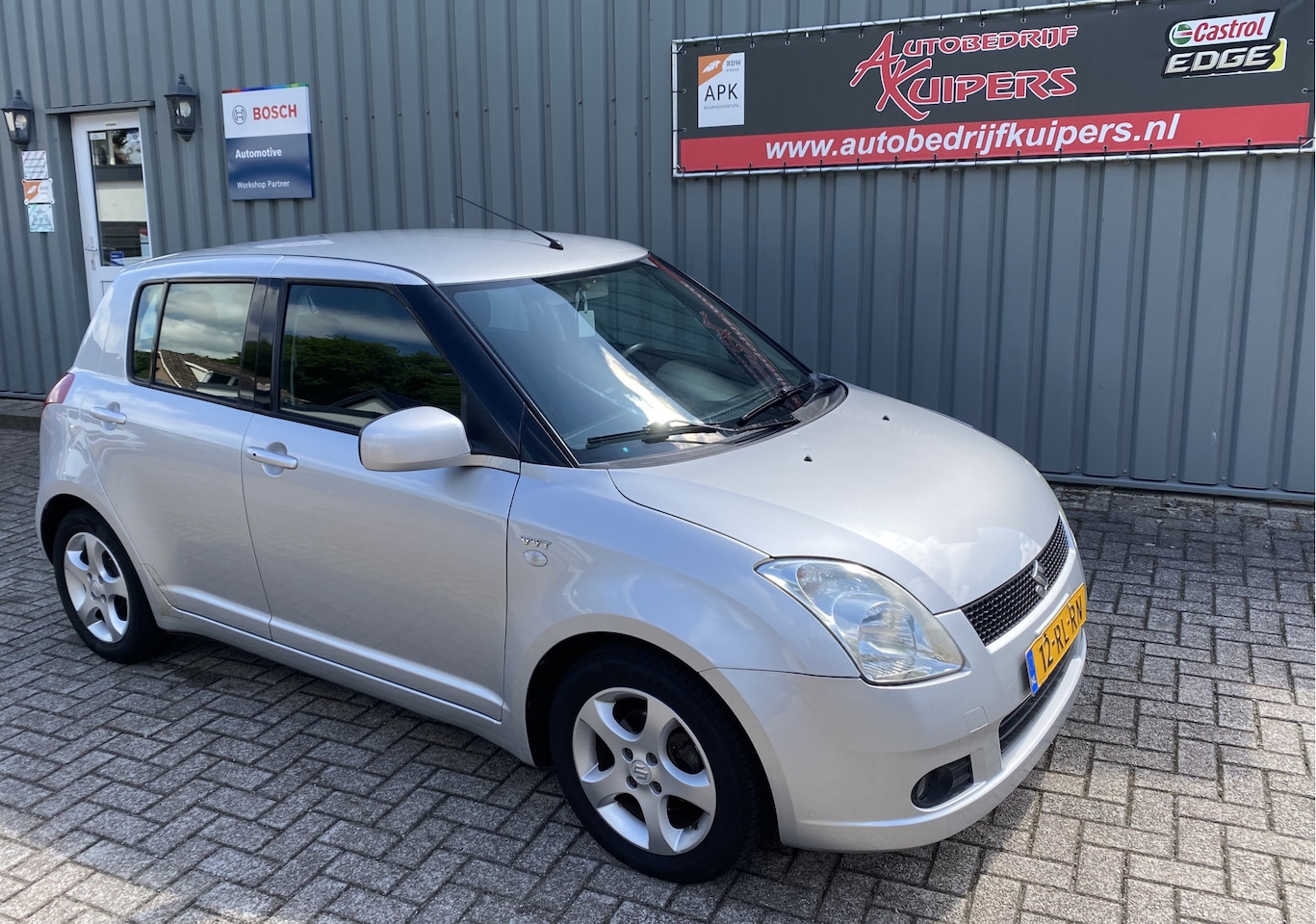 Suzuki Swift - 1.5 Exclusive Airco.Lm.velgen.Trekhaak.Audio - AutoWereld.nl