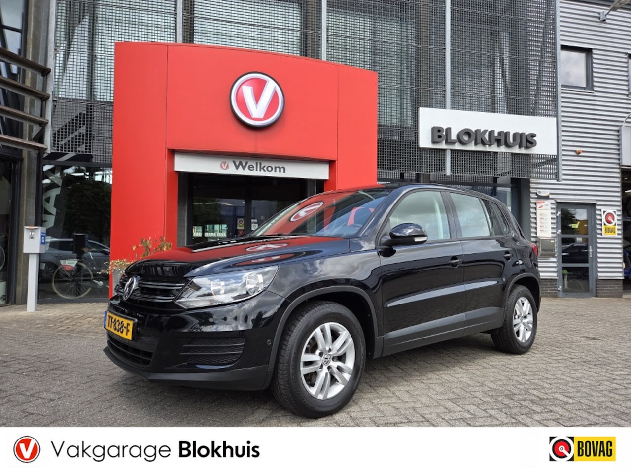 Volkswagen Tiguan - 1.4 TSI 150pk A/T Sport&Style | Navi - AutoWereld.nl