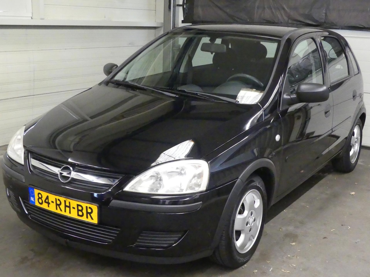 Opel Corsa - 1.2-16V Rhythm - Airco - 5deurs - Weinig KM NAP! - AutoWereld.nl