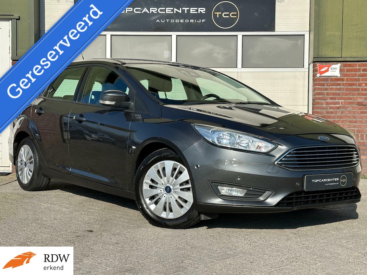 Ford Focus Wagon - 1.0 Trend Edition/PARKS/NAVI/CRUISE/APK - AutoWereld.nl