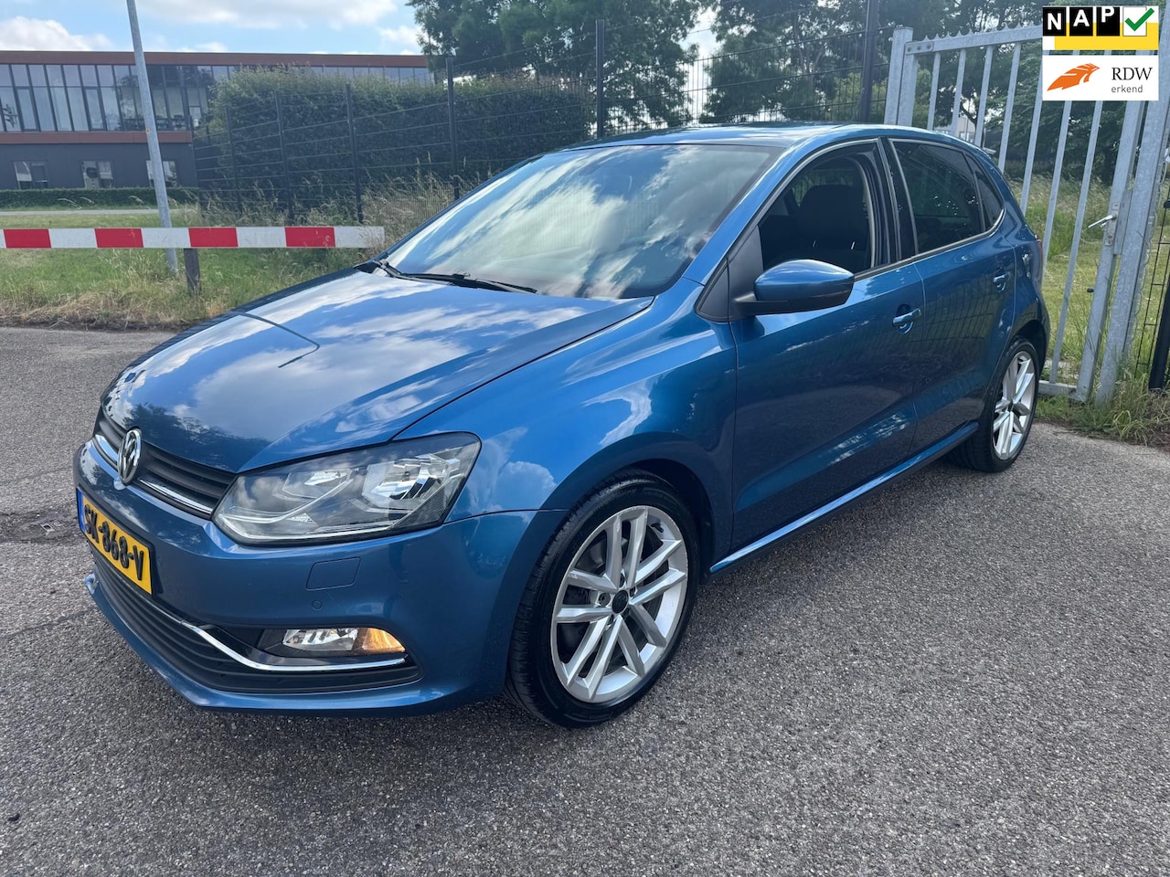 Volkswagen Polo - 1.4 TDI First Edition Clima Cruise Navi PDC LM - AutoWereld.nl
