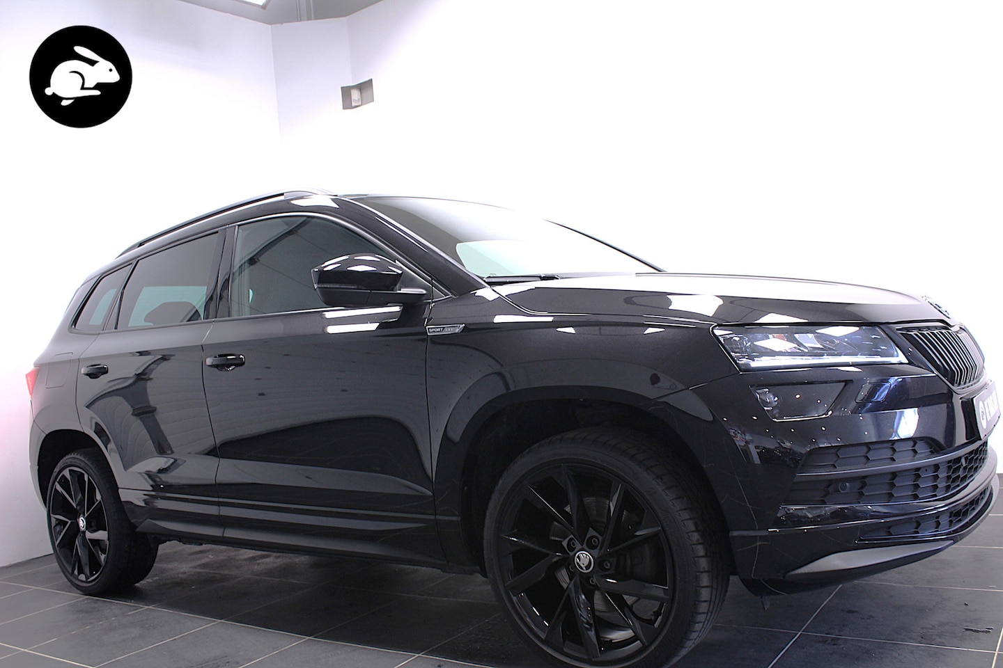 Skoda Karoq - 1.5 TSI Sportline/Trekhaak/19 inch/Camera/Acc - AutoWereld.nl