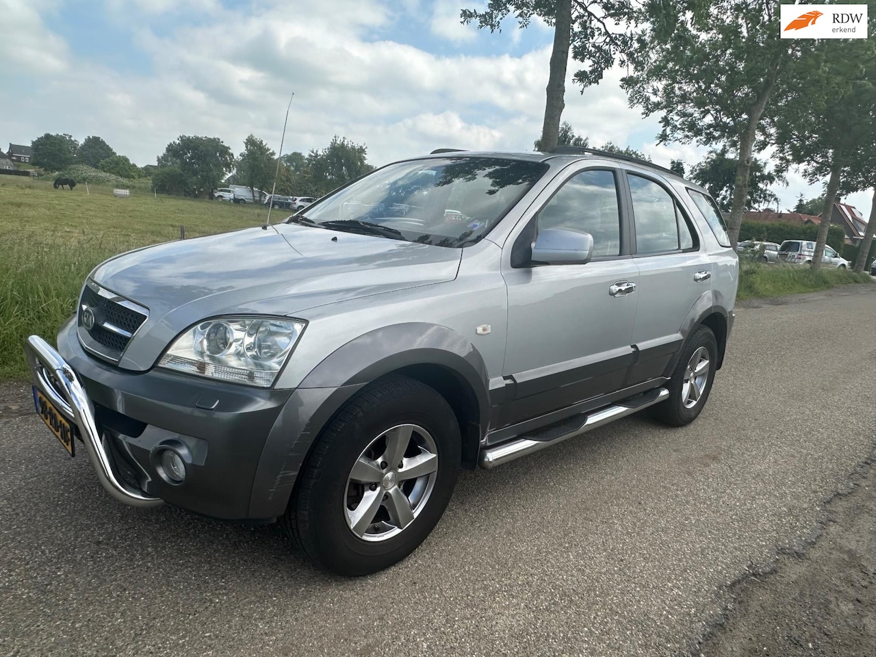 Kia Sorento - 2.4i EX Luxe 4x4 Airco, Cruise, Leder - AutoWereld.nl