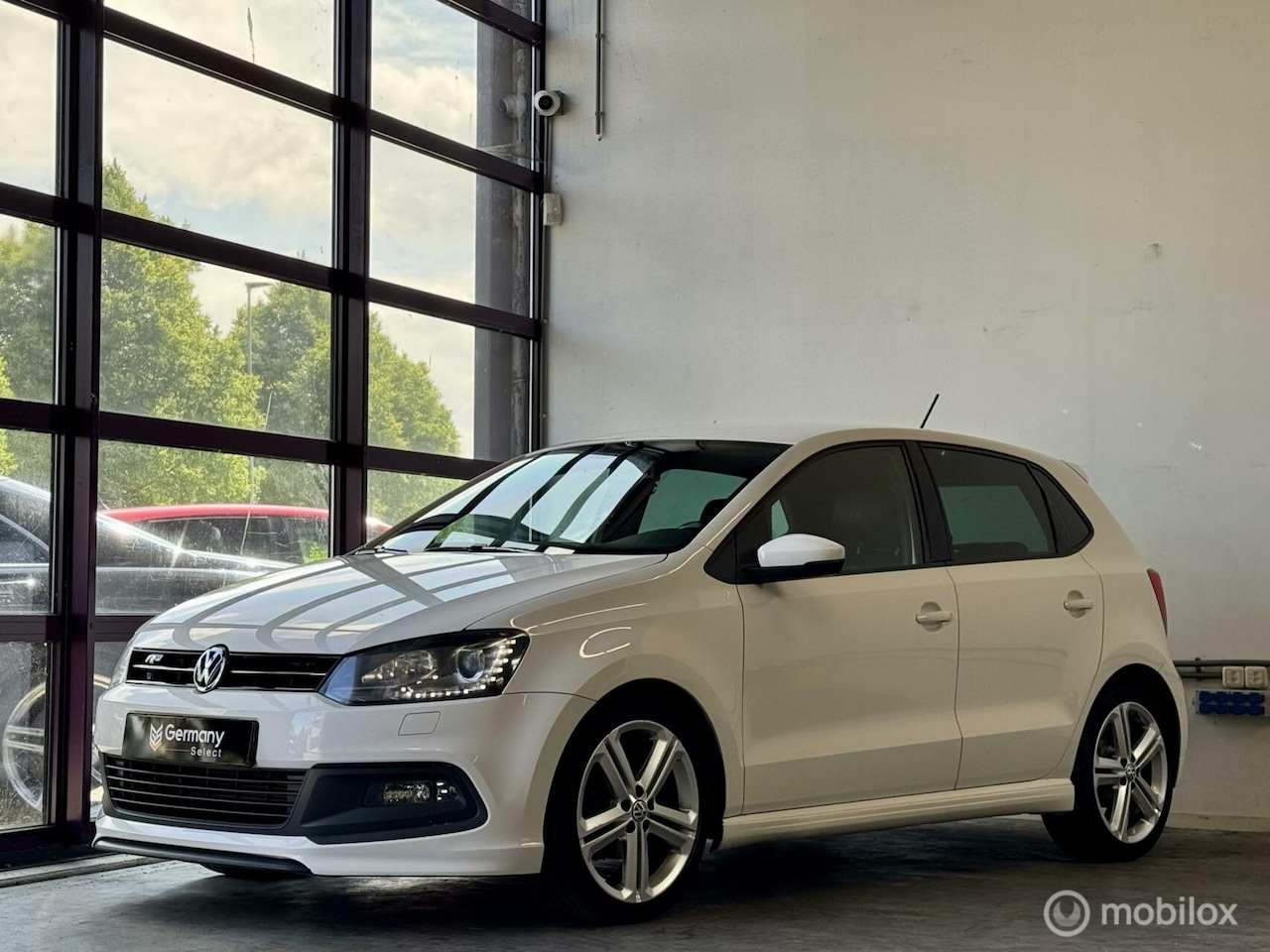 Volkswagen Polo - 5drs 1.2 TSI R-Line ''Candy White'' Xenon - AutoWereld.nl