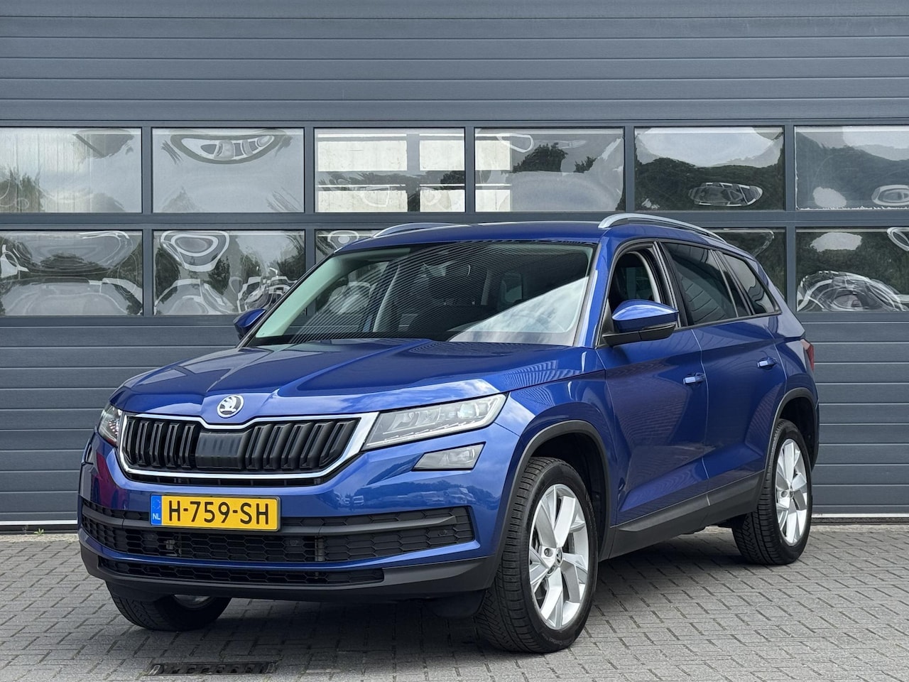 Skoda Kodiaq - 1.5 TSI LIMITED BUSINESS EDITION 7-PERS I TREKHAAK I AUTOMAAT I ADAPTIVE CRUISE CONTROL I - AutoWereld.nl