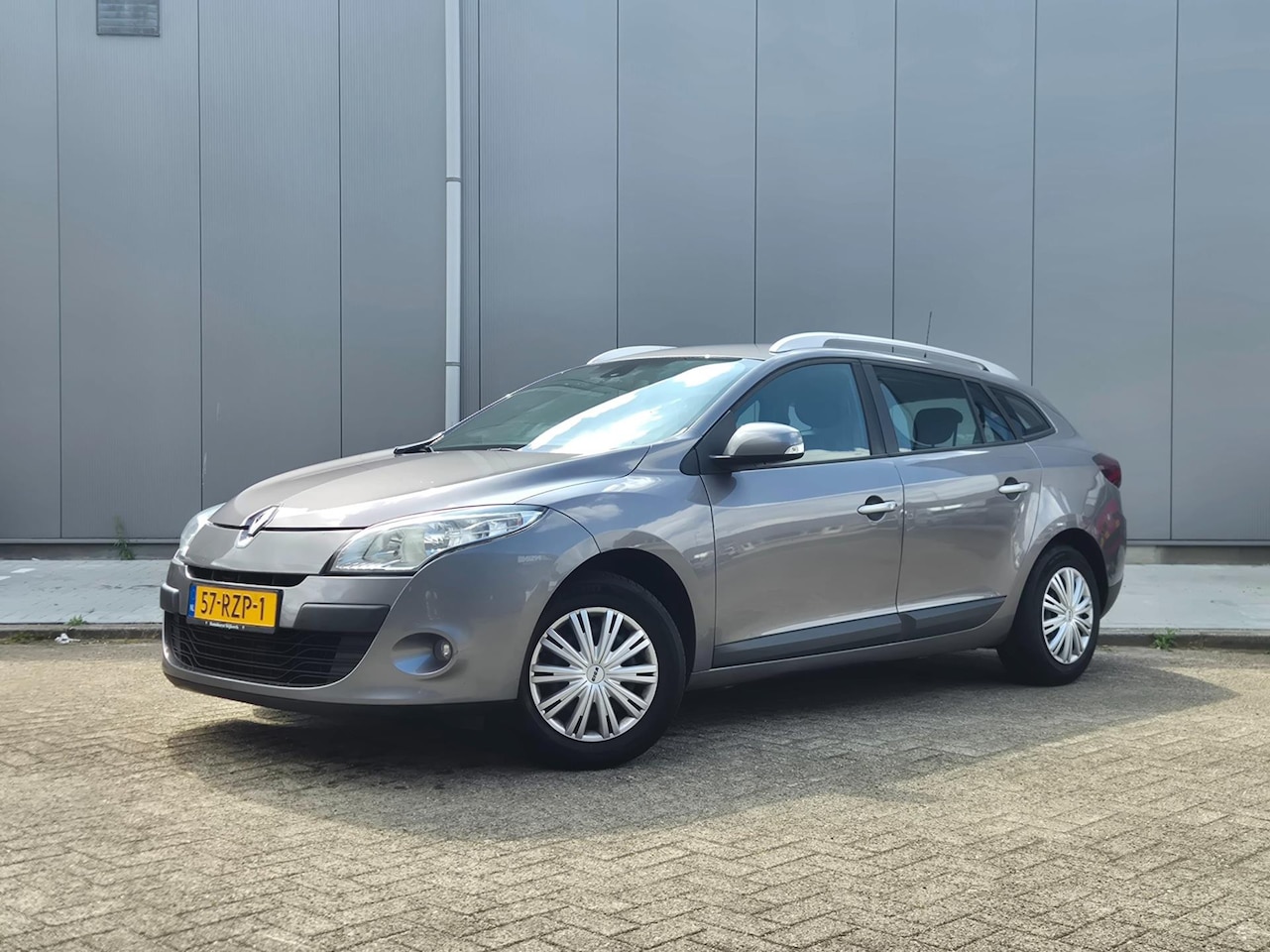 Renault Mégane Estate - 1.5 dCi Expression Airco Navi Cruise - AutoWereld.nl