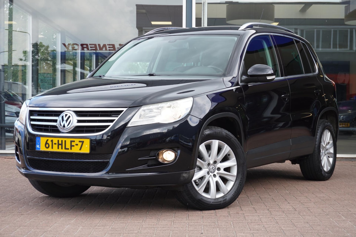 Volkswagen Tiguan - 1.4 TSI Sport&Style 4Motion 5deurs | Airco | Navigatie | Leder | Hoge instap |Elek. Pakket - AutoWereld.nl
